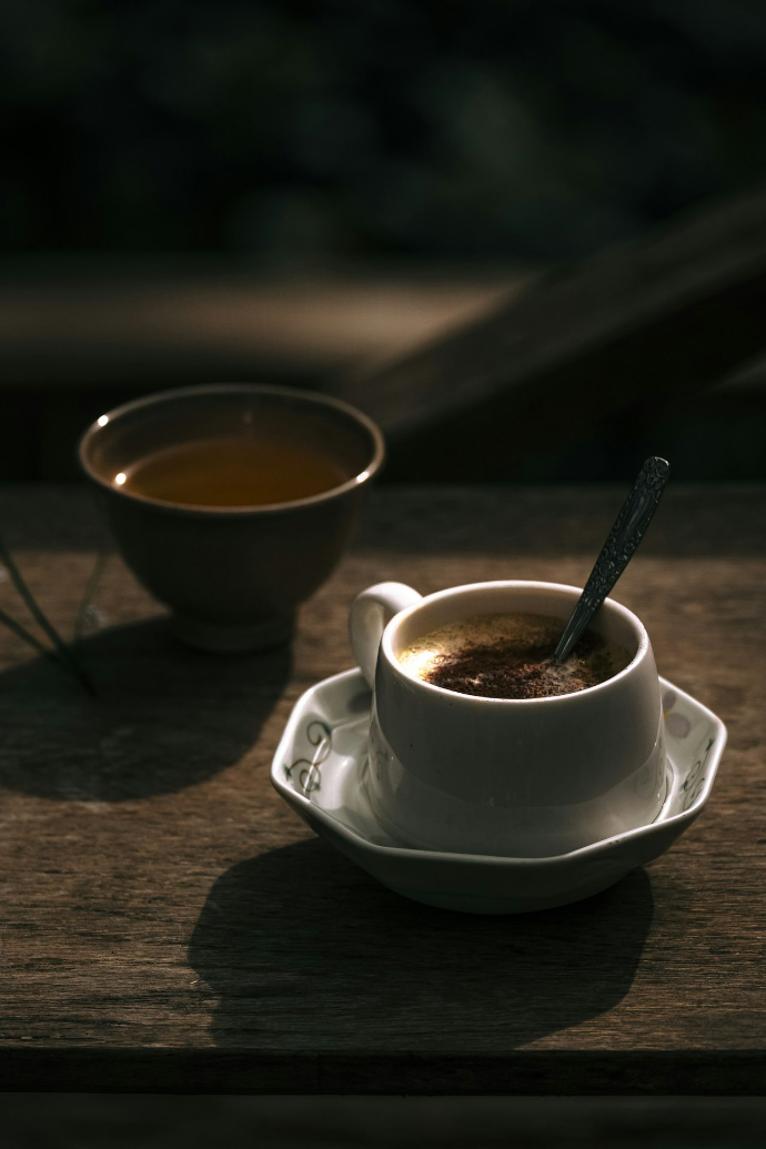 a cup of coffee sitting on top of a saucer